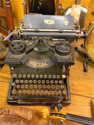 typewriter on wooden desk